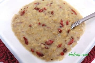 A bowl of oatmeal with goji berries.
