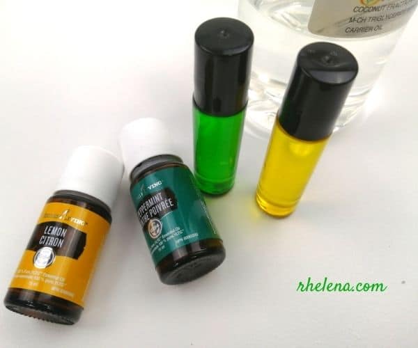 Two roller bottles shown with peppermint essential oil and lemon essential oil.