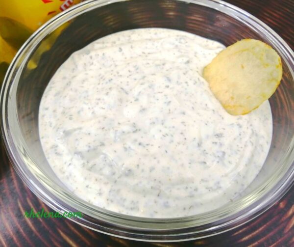 Ranch dip with Greek yogurt shown with a potato chip.