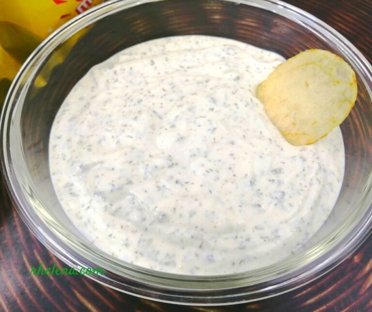 Ranch dip with Greek yogurt shown with a potato chip.