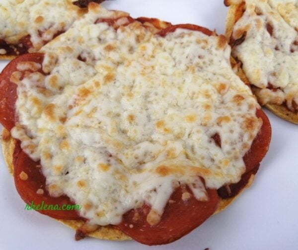 Corn tortilla pizza snack shown on a 5 inch corn tortilla.
